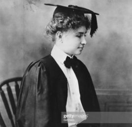 Black and White photography of Helen Keller in mortar board and graduation gown