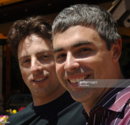 Photograph of Sergey Brin & Larry Page next to each other smiling