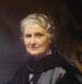 Oil painting of Maria Montessori holding a book